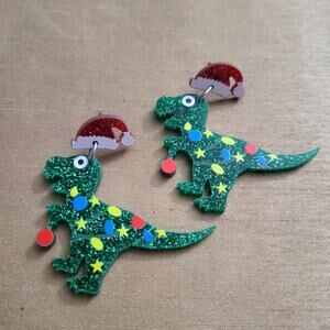 Glitter Dinosaur T-rex wearing Christmas lights and santa hat earrings